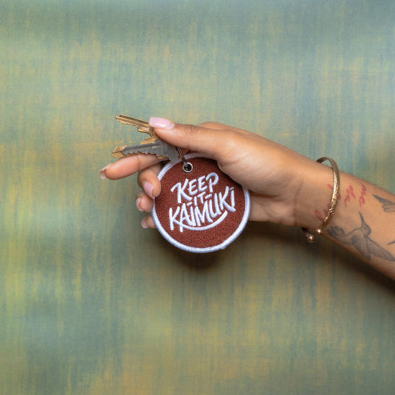 KIK '25 - Kaimukī Brown Fabric Round Keychain
